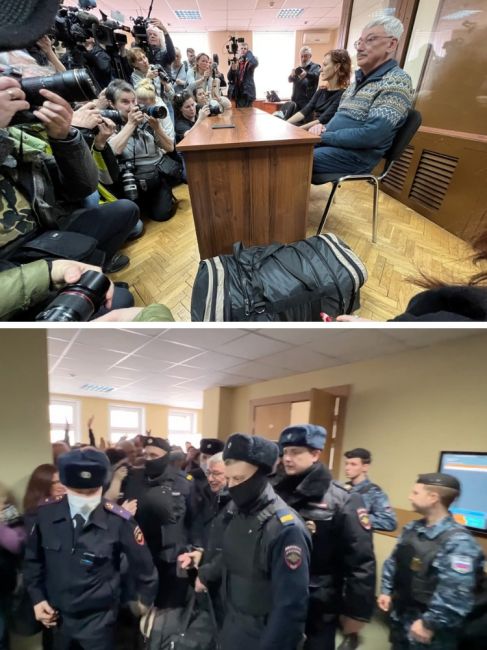 Фото дня: толпа силовиков в масках уводит 70-летнего правозащитника Олега Орлова, которому суд назначил 2,5..