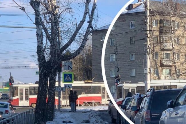 В Новосибирске подросток забрался на крышу трамвая, следовавшего по маршруту №18. 

Горожане заметили..